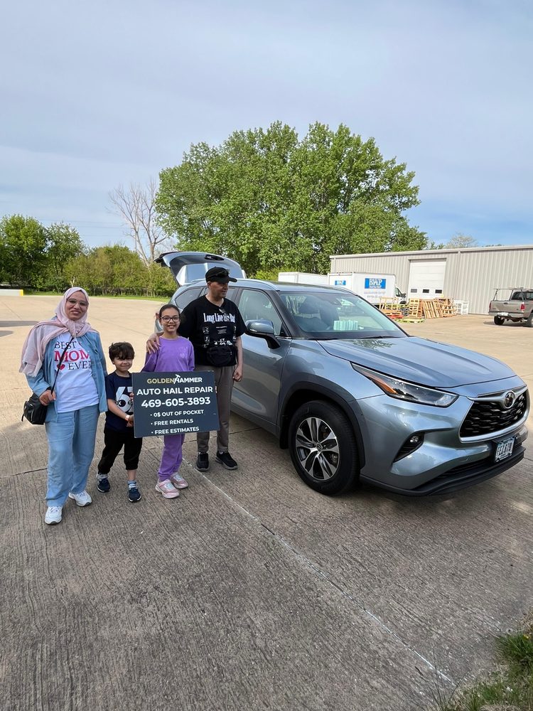 Abdelmajid and family with their restored Toyota Highlander