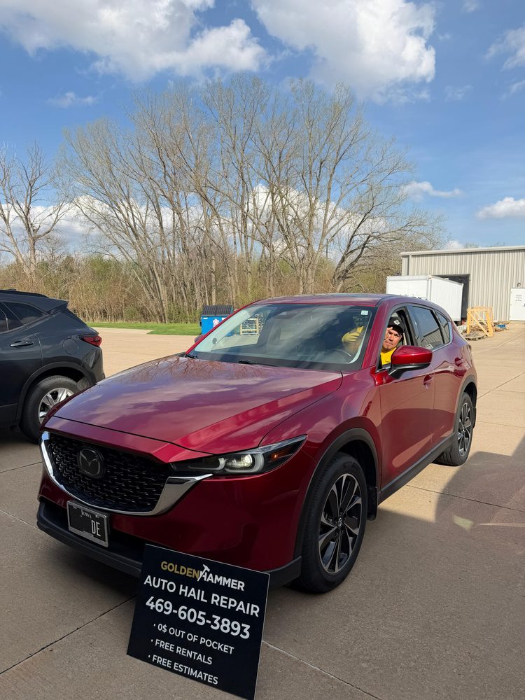 Rosa Atayde Amaya with her restored Mazda CX-5
